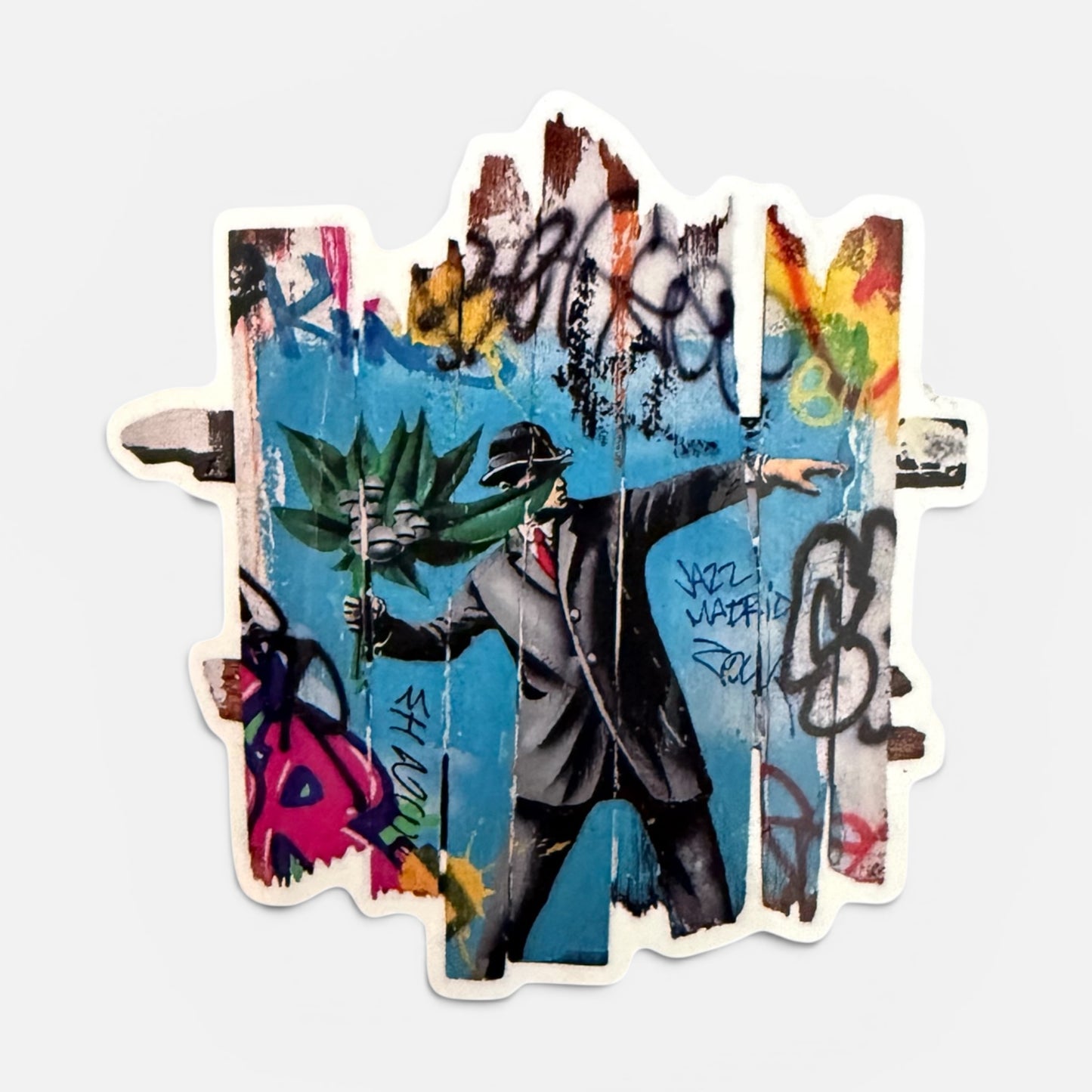 Sticker street art hommage Banksy Magritte lanceur de fleur graffiti Art Is Our Weapon Onemizer